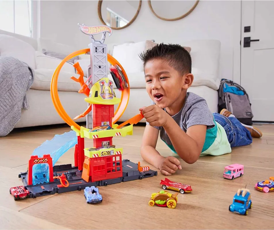 خرید پیست مسابقه، پیست هات ویلز، پیست سرعت، پیست ایستگاه، پیست ماشین آتشنشانی، پیست فرار، پیست بازی ماشین هات ویلز «ست بازی ایستگاه آتشنشانی» پیست مسابقه  Hot Wheels Fire Station With Circle Runway HCX41MAT