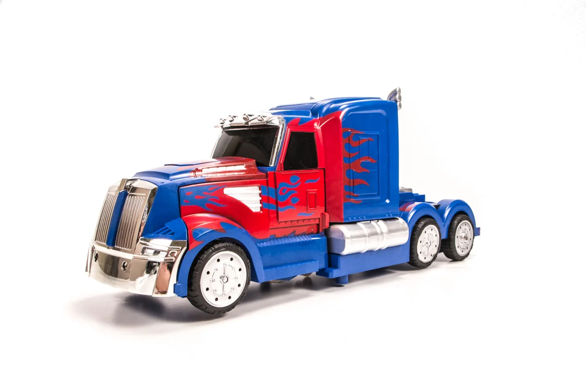 خرید ماشین کنترلی «ربات کامیون آپتیموس پرایم ترانسفورمور، ماشین تغییر شکل دهنده»  MZ Transformers Robot Deformation Remote Control Optimus Prime Car MZ 2335P