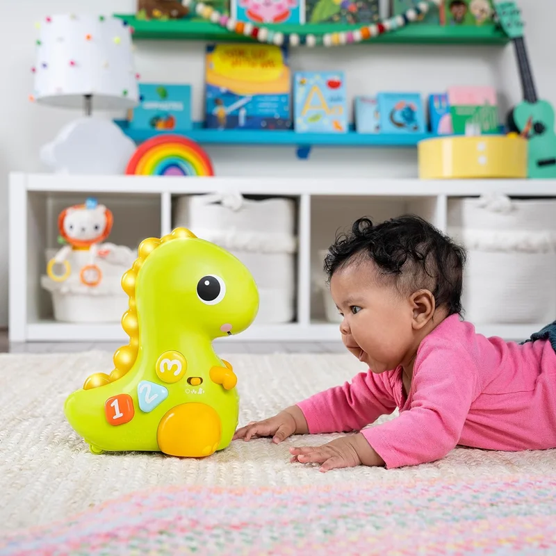 خرید اسباب بازی بریت استارتس «گربه GO Go Dino» دایناسور گوگو دینو  Bright Starts Go Go Dino Cat and Count Baby Toy P1321Bright Starts Go Go Dino Cat and Count Baby Toy P1321