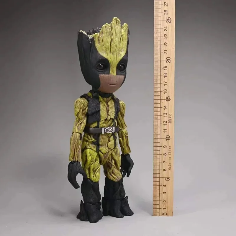 فیگور گروت در لباس ولورین Groot Tree Man Cos Wolverine در کنار خطکش