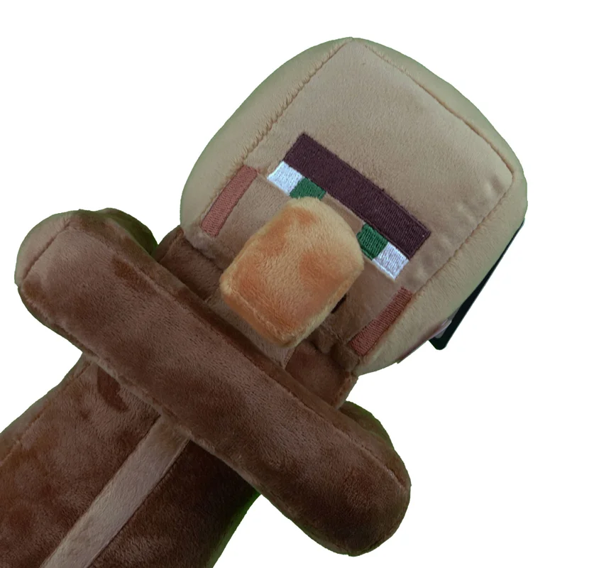 عروسک پولیشی ماینکرفت ویلیجر نمای نزدیک از چهره و جزئیات عروسک ویلیجر